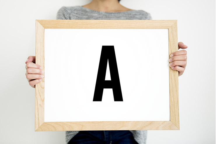 Woman holding paper board